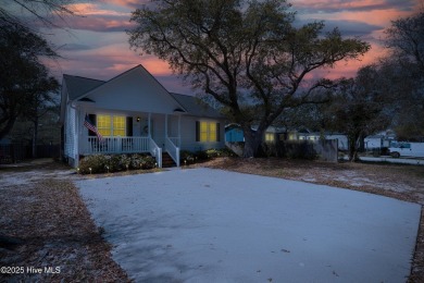 Imagine stepping into a charming getaway on Oak Island, NC on Founders Club At St. James Plantation in North Carolina - for sale on GolfHomes.com, golf home, golf lot