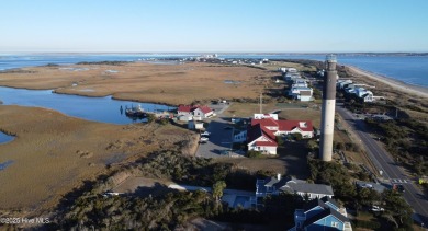 Imagine stepping into a charming getaway on Oak Island, NC on Founders Club At St. James Plantation in North Carolina - for sale on GolfHomes.com, golf home, golf lot