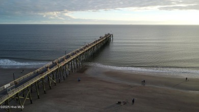 Imagine stepping into a charming getaway on Oak Island, NC on Founders Club At St. James Plantation in North Carolina - for sale on GolfHomes.com, golf home, golf lot