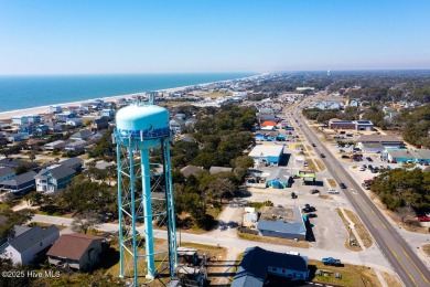 Imagine stepping into a charming getaway on Oak Island, NC on Founders Club At St. James Plantation in North Carolina - for sale on GolfHomes.com, golf home, golf lot