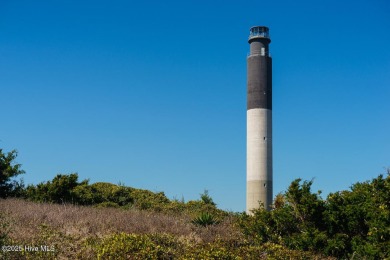Imagine stepping into a charming getaway on Oak Island, NC on Founders Club At St. James Plantation in North Carolina - for sale on GolfHomes.com, golf home, golf lot