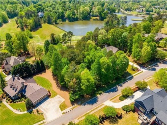 DEVELOPER WAS HOLDING THE BEST LOT IN ROYAL LAKES FOR HIMSELF on Royal Lakes Golf and Country Club in Georgia - for sale on GolfHomes.com, golf home, golf lot