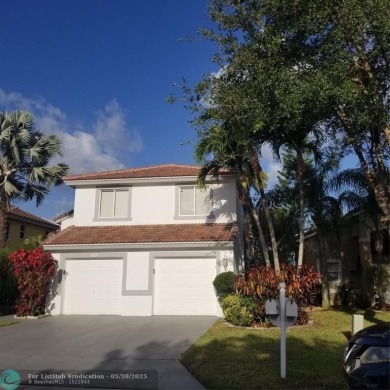 Nestled in the highly sought-after, gated golf course community on Atlantic National Golf and Country Club in Florida - for sale on GolfHomes.com, golf home, golf lot