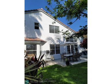 Nestled in the highly sought-after, gated golf course community on Atlantic National Golf and Country Club in Florida - for sale on GolfHomes.com, golf home, golf lot