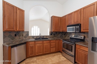 Beautiful single level home situated on a lush golf course lot on The Foothills Golf Club in Arizona - for sale on GolfHomes.com, golf home, golf lot