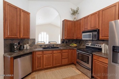 Beautiful single level home situated on a lush golf course lot on The Foothills Golf Club in Arizona - for sale on GolfHomes.com, golf home, golf lot