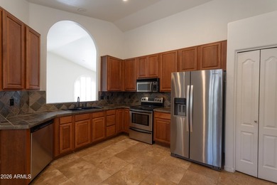 Beautiful single level home situated on a lush golf course lot on The Foothills Golf Club in Arizona - for sale on GolfHomes.com, golf home, golf lot