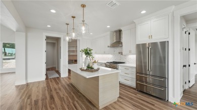 This stunning new build with exceptional views is located on the on The Bandit Golf Club in Texas - for sale on GolfHomes.com, golf home, golf lot
