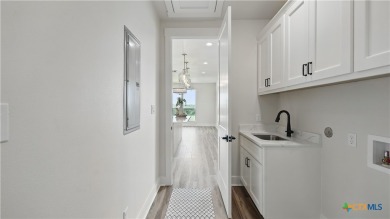 This stunning new build with exceptional views is located on the on The Bandit Golf Club in Texas - for sale on GolfHomes.com, golf home, golf lot