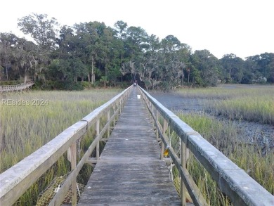 Mature magnolia and live oak trees are abundant on this .575 on Callawassie Island Club in South Carolina - for sale on GolfHomes.com, golf home, golf lot