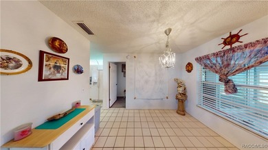 Make sure to check out the Virtual Tour for a 3D Model w/ on Meadow Oaks Golf and Country Club in Florida - for sale on GolfHomes.com, golf home, golf lot