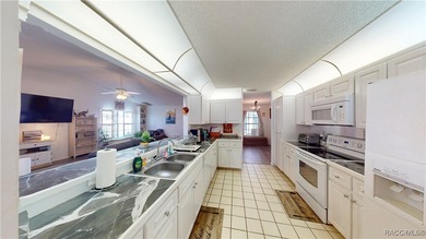 Make sure to check out the Virtual Tour for a 3D Model w/ on Meadow Oaks Golf and Country Club in Florida - for sale on GolfHomes.com, golf home, golf lot