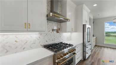 This stunning new build with exceptional views is located on the on The Bandit Golf Club in Texas - for sale on GolfHomes.com, golf home, golf lot