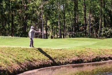 Mature magnolia and live oak trees are abundant on this .575 on Callawassie Island Club in South Carolina - for sale on GolfHomes.com, golf home, golf lot