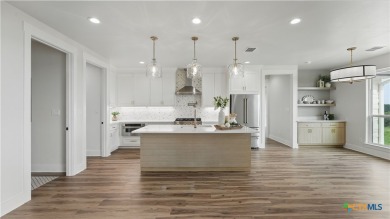 This stunning new build with exceptional views is located on the on The Bandit Golf Club in Texas - for sale on GolfHomes.com, golf home, golf lot