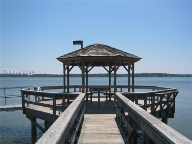 Mature magnolia and live oak trees are abundant on this .575 on Callawassie Island Club in South Carolina - for sale on GolfHomes.com, golf home, golf lot