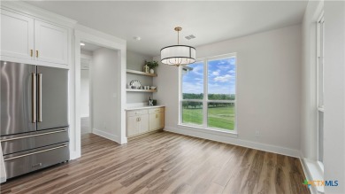 This stunning new build with exceptional views is located on the on The Bandit Golf Club in Texas - for sale on GolfHomes.com, golf home, golf lot