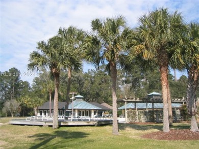 Mature magnolia and live oak trees are abundant on this .575 on Callawassie Island Club in South Carolina - for sale on GolfHomes.com, golf home, golf lot