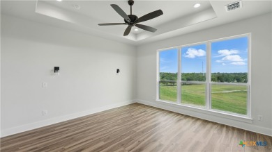 This stunning new build with exceptional views is located on the on The Bandit Golf Club in Texas - for sale on GolfHomes.com, golf home, golf lot