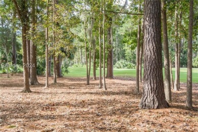 Mature magnolia and live oak trees are abundant on this .575 on Callawassie Island Club in South Carolina - for sale on GolfHomes.com, golf home, golf lot