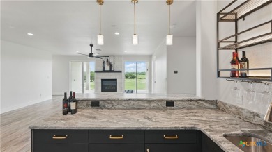 This stunning new build with exceptional views is located on the on The Bandit Golf Club in Texas - for sale on GolfHomes.com, golf home, golf lot