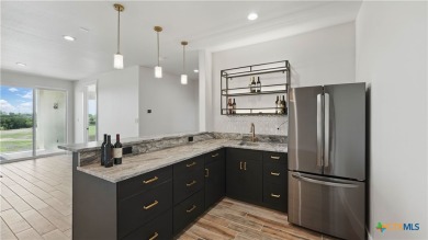 This stunning new build with exceptional views is located on the on The Bandit Golf Club in Texas - for sale on GolfHomes.com, golf home, golf lot
