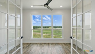 This stunning new build with exceptional views is located on the on The Bandit Golf Club in Texas - for sale on GolfHomes.com, golf home, golf lot