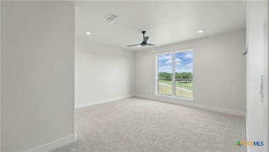 This stunning new build with exceptional views is located on the on The Bandit Golf Club in Texas - for sale on GolfHomes.com, golf home, golf lot