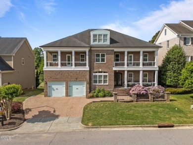 This 4 bedroom, 4 and a half-bath home offers over 170 feet of on TPC at Wakefield Plantation in North Carolina - for sale on GolfHomes.com, golf home, golf lot