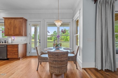 This 4 bedroom, 4 and a half-bath home offers over 170 feet of on TPC at Wakefield Plantation in North Carolina - for sale on GolfHomes.com, golf home, golf lot