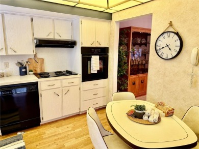 This 1400 sq ft 2 bedroom two bath unit is only a block away on On Top Of The World Golf Course in Florida - for sale on GolfHomes.com, golf home, golf lot