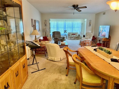 This 1400 sq ft 2 bedroom two bath unit is only a block away on On Top Of The World Golf Course in Florida - for sale on GolfHomes.com, golf home, golf lot