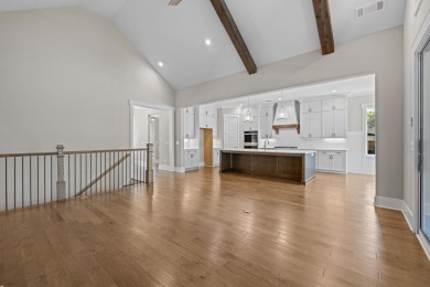 Experience refined living in this golf-front masterpiece by on Harbor Club Golf and Country Club in Georgia - for sale on GolfHomes.com, golf home, golf lot