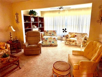 This 1400 sq ft 2 bedroom two bath unit is only a block away on On Top Of The World Golf Course in Florida - for sale on GolfHomes.com, golf home, golf lot