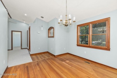 This charming 3-bedroom, 2-bath home is nestled in the desirable on The Country Club of the Crystal Coast in North Carolina - for sale on GolfHomes.com, golf home, golf lot