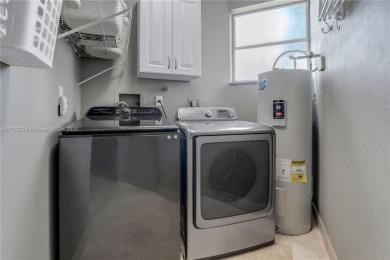 Rarely available first floor corner unit in the prestigious on Grand Palms Hotel and Golf Resort in Florida - for sale on GolfHomes.com, golf home, golf lot