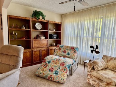 This 1400 sq ft 2 bedroom two bath unit is only a block away on On Top Of The World Golf Course in Florida - for sale on GolfHomes.com, golf home, golf lot