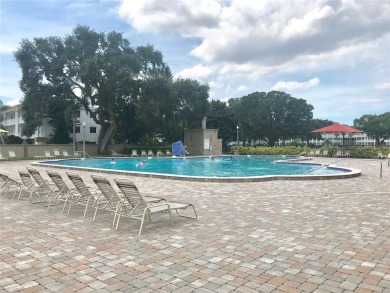 This 1400 sq ft 2 bedroom two bath unit is only a block away on On Top Of The World Golf Course in Florida - for sale on GolfHomes.com, golf home, golf lot