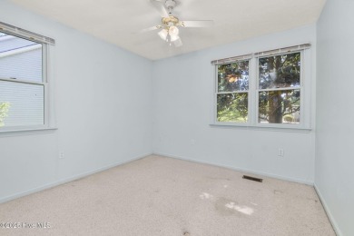 This charming 3-bedroom, 2-bath home is nestled in the desirable on The Country Club of the Crystal Coast in North Carolina - for sale on GolfHomes.com, golf home, golf lot