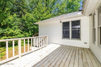 This charming 3-bedroom, 2-bath home is nestled in the desirable on The Country Club of the Crystal Coast in North Carolina - for sale on GolfHomes.com, golf home, golf lot
