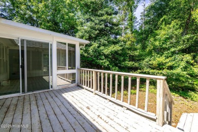 This charming 3-bedroom, 2-bath home is nestled in the desirable on The Country Club of the Crystal Coast in North Carolina - for sale on GolfHomes.com, golf home, golf lot