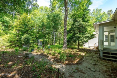 This charming 3-bedroom, 2-bath home is nestled in the desirable on The Country Club of the Crystal Coast in North Carolina - for sale on GolfHomes.com, golf home, golf lot