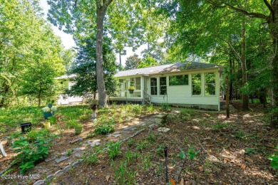 This charming 3-bedroom, 2-bath home is nestled in the desirable on The Country Club of the Crystal Coast in North Carolina - for sale on GolfHomes.com, golf home, golf lot