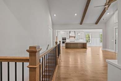 Experience refined living in this golf-front masterpiece by on Harbor Club Golf and Country Club in Georgia - for sale on GolfHomes.com, golf home, golf lot