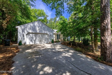 This charming 3-bedroom, 2-bath home is nestled in the desirable on The Country Club of the Crystal Coast in North Carolina - for sale on GolfHomes.com, golf home, golf lot