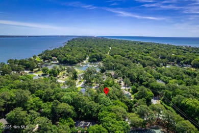 This charming 3-bedroom, 2-bath home is nestled in the desirable on The Country Club of the Crystal Coast in North Carolina - for sale on GolfHomes.com, golf home, golf lot