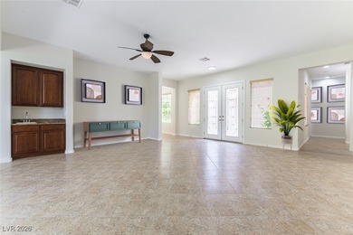 Step into refined living in this impeccably maintained Trenton on Revere Golf Club in Nevada - for sale on GolfHomes.com, golf home, golf lot