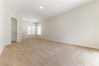 Step into refined living in this impeccably maintained Trenton on Revere Golf Club in Nevada - for sale on GolfHomes.com, golf home, golf lot