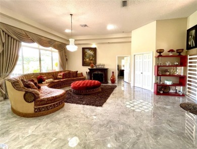 Located behind the prestigious guard-gated entrances of Eagle on TPC Eagle Trace in Florida - for sale on GolfHomes.com, golf home, golf lot