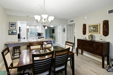 This 1st floor unit has a perfect blend of Comfort and on Oaks Country Club in Florida - for sale on GolfHomes.com, golf home, golf lot